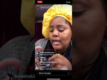 tokyo wearing a yellow hat on her instagram live video talking to fans 